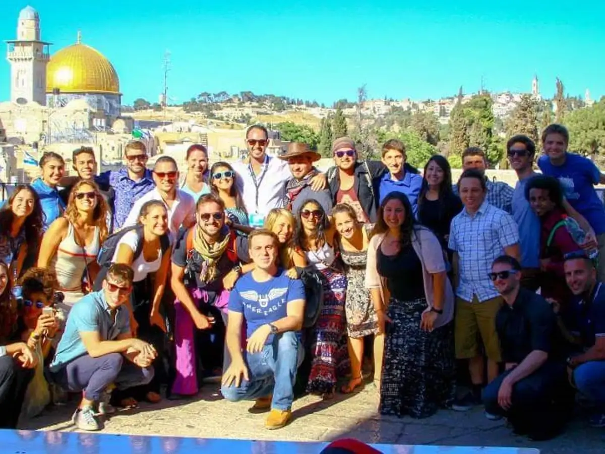 Crvne and the rest of his Birthright group posing in front of the Temple Mount in Israel.