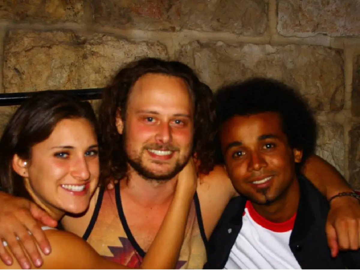 Crvne, on the right, in Israel with his late friend Kenton, in the middle, and their friend Laura to the left.