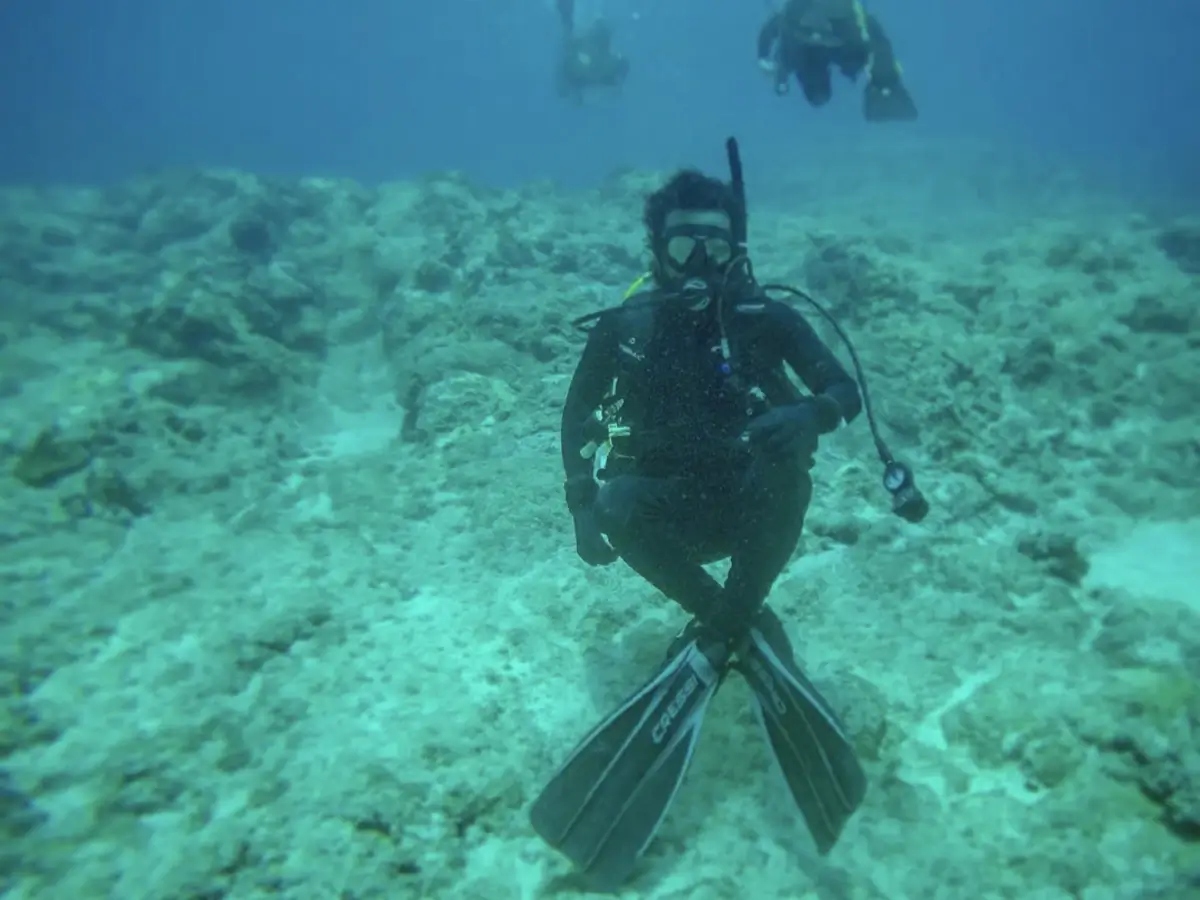 Crvne underwater in full scuba gear.
